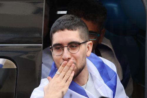 epa12483938 Released Israeli hostage Evyatar David waves to crowds as he returns to his home after completing hospitalization and treatment period, in Kfar Sava, Israel, 26 October 2025. Evyatar David was kidnapped by Hamas from the Nova music festival at the Gaza border 07 October 2023 and released during a ceasefire agreement between Hamas and Israel. The...