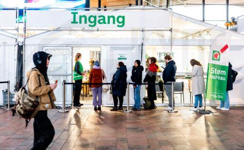 epa12490839 Voters wait in line to cast their ballots at a polling station in Rotterdam, The Netherlands, 29 October 2025. The Netherlands is holding an early general election on 29 October, to elect a new House of Representatives.  EPA/IRIS VAN DEN BROEK