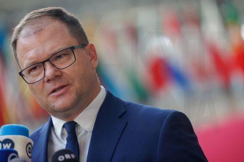 epa12502527 Minister of the Environment, Nature Conservation and Nuclear Safety of Germany Carsten Schneider speaks with the media during the European Environment Council meeting in Brussels, Belgium, 04 November 2025. European environment ministers are in Brussels to discuss the European Climate Law amendment and the urgent need for postponement and...
