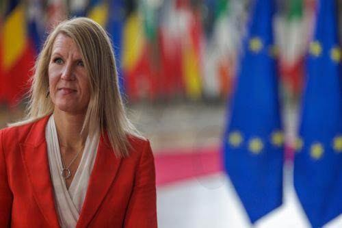 epa12502533 Minister of the Environment and Climate Change of Finland Sari Multala speaks with the media during the European Environment Council meeting in Brussels, Belgium, 04 November 2025. European environment ministers are in Brussels to discuss the European Climate Law amendment and the urgent need for postponement and substantive simplification of...