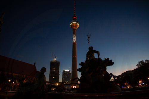 epa12506983 Activists from the environmental protest organization Greenpeace demonstrate with a projection onto the TV Tower in Berlin, Germany, 06 November 2025. Ahead of the World Climate Conference 'COP30', taking place in Brazil, Greenpeace activists projected a burning globe and the slogan 'Act Now!' onto the TV Tower.  EPA/CLEMENS BILAN