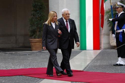epa12510695 Italian Prime Minister Giorgia Meloni (L) welcomes President of the Palestinian National Authority Mahmoud Abbas (C) prior to their meeting at Palazzo Chigi in Rome, Italy, 07 November 2025.  EPA/FABIO FRUSTACI