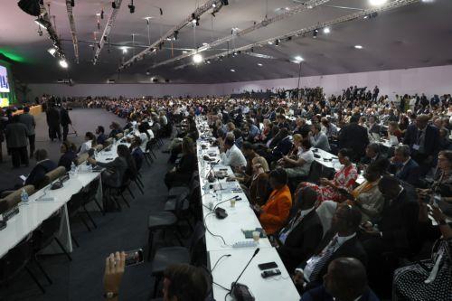 epa12516260 People attend the United Nations Climate Change Conference COP30 in Belem, Brazil, 10 November 2025. Representatives from some 170 countries are participating in the 30th United Nations Climate Change Conference, COP30, which will run until November 21.  EPA/Antonio Lacerda