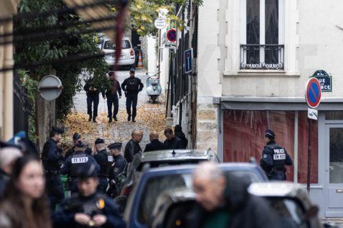 epa12516344 Police officers stand guard next to the house of former French President Nicolas Sarkozy after a court decision to release him, in Paris, France, 10 November 2025. A French appeals court approved a request for an early release of Sarkozy, who was sentenced to five years in jail for his role in the case involving funds from Gaddafi. The former PM...