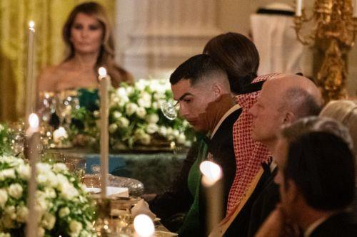 epa12534826 Portuguese soccer player Cristiano Ronaldo looks on as President Donald Trump delivers remarks at a dinner for Crown Prince and Prime Minister of the Kingdom of Saudi Arabia, Mohammed bin Salman at the White House in Washington, DC, USA, 18 November 2025.  EPA/ANNA ROSE LAYDEN  / POOL