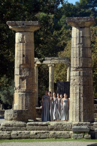 epa12545722 Actresses perform during the rehearsal of the Olympic flame lighting ceremony for the Milano Cortina 2026 Winter Olympics at the Ancient Olympia site in southern Greece, 24 November 2025. The Milano Cortina 2026 Winter Olympics will be held from 06 February to 22 February 2026.  EPA/DIMITRIS PAPAIOANNOU