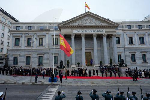 epa12573750 Soldiers and officials participate in a flag-raising ceremony during the celebration of Constitution Day at the Lower House in Madrid, Spain, 06 December 2025. Spain celebrates Constitution Day every year on 06 December, marking the day that its constitution was ratified in 1978.  EPA/Borja Sanchez-Trillo