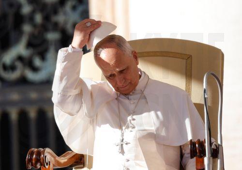 epa12573758 Pope Leo XIV adjusts his skullcap as he leads the Jubilee Audience in St. Peter's Square, Vatican City, 06 December 2025, as part of the Jubilee Year of Hope.  EPA/GIUSEPPE LAMI