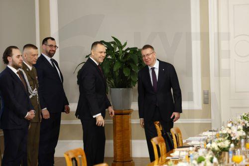 epa12584977 Latvian President Edgars Rinkevics (R) and Polish President Karol Nawrocki (C) during their meeting in Riga, Latvia, 11 December 2025.  EPA/TOMS KALNINS