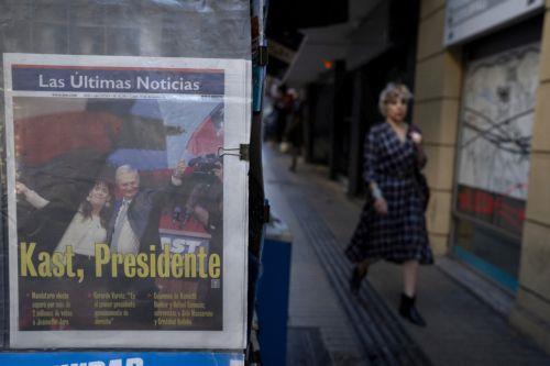epa12594397 Photograph of a newspaper announcing the results of the presidential elections in Santiago, Chile, 15 December 2025. The far-right Jose Antonio Kast won the second round of the presidential elections in Chile on 14 December.  EPA/ADRIANA THOMASA