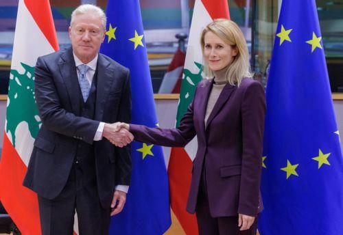 epa12594506 EU High Representative for Foreign Affairs and Security Policy Kaja Kallas (R) welcomes Lebanon’s Minister of Foreign Affairs and Emigrants, Youssef Rajji during the EU-Lebanon Association Council in Brussels, Belgium, 15 December 2025.  EPA/OLIVIER MATTHYS