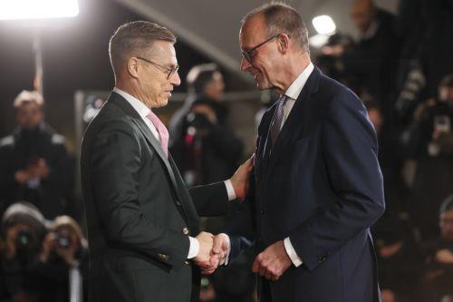 epa12594562 German Chancellor Friedrich Merz (R) welcomes Finnish President Alexander Stubb (L) at the Federal Chancellery in Berlin, Germany, 15 December 2025. Berlin hosts US-Ukraine negotiations on a proposed peace plan, including a possible ceasefire in Ukraine, and a broader multilateral summit with key European leaders.  EPA/HANNIBAL HANSCHKE