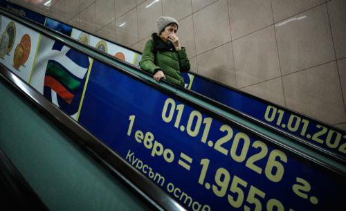 epa12616781 An woman descends an escalator featuring a euro adoption poster in Sofia, Bulgaria, 29 December 2025. Bulgaria is set to become the 21st member of the eurozone on 01 January 2026, transitioning from the national lev to the euro amid public concerns that the move could trigger immediate price hikes and a higher cost of living.  EPA/BORISLAV...