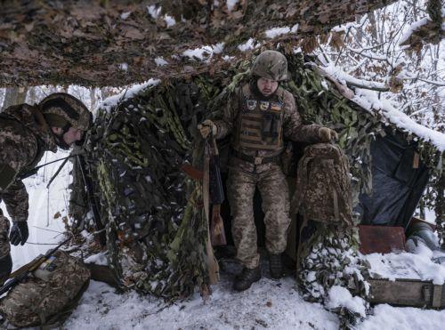 epa12618047 A handout photo made available by the press service of the 93rd 'Kholodnyi Yar' Separate Mechanized Brigade of the Ukrainian Armed Forces shows servicemen from the brigade conducting rotation at an undisclosed location near the frontline city of Kostyantynivka, Donetsk region, eastern Ukraine, 30 December 2025, amid the Russian invasion. ...