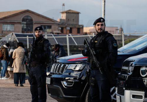epa12618081 Italian Carabinieri are patrolling the Circo Massimo as part of the security plan for New Year's Eve celebrations in Rome, Italy, 30 December 2025. Cities across the country are preparing for the festivities with various security measures and restrictions, which include the use of metal detectors and restricted access to major public squares,...
