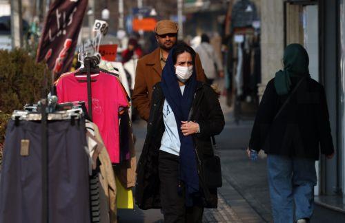 epa12635823 Iranians walk on a street in Tehran, Iran, 08 January 2026. Following a sharp decline in the national currency and soaring prices for basic goods, the country is facing a wave of nationwide anti-government protests which has spread to 37 cities across 24 provinces, according to the Human Rights Activists News Agency (HRANA).  EPA/ABEDIN...