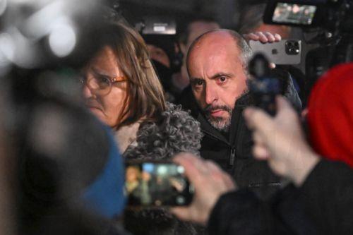 epa12637568 French owner of the bar in Crans-Montana, where the deadly fire happened on New Year's Day, Jacques Moretti (R) arrives for questioning by the Valais public prosecutor's office in Sion, Switzerland, 09 January 2026. Swiss authorities have confirmed 40 fatalities, mostly teenagers and young adults, and 116 severe injuries following a fire at the...