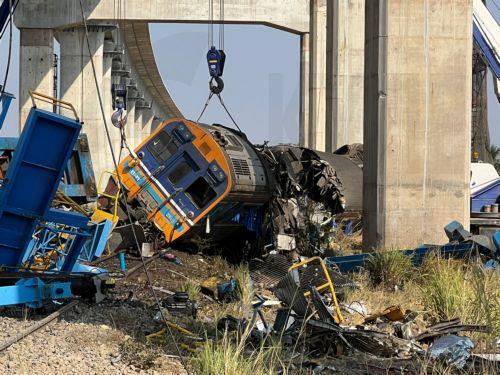 epa12648015 A view of the wreckage of a passenger train after a construction crane collapsed onto it in Sikhio district, Nakhon Ratchasima, Thailand, 14 January 2026. At least 22 people were killed and more than 79 others injured when the crane fell on the Special Express No. 21 train traveling from Bangkok to Ubon Ratchathani, according to local police....