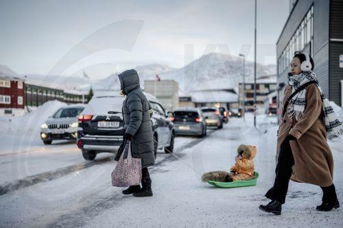 epa12666322 People walk along an icy street in Nuuk, Greenland, 20 January 2026 (issued 21 January 2026).  EPA/MADS CLAUS RASMUSSEN  DENMARK OUT