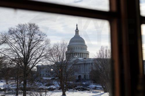 epa12691597 The US Capitol is seen through a window in Washington, DC, USA, 29 January 2026.  EPA/WILL OLIVER