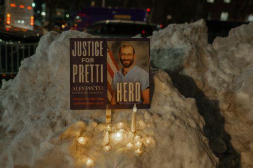 epa12691789 Candles illuminate a sign bearing the portrait of Veterans Affairs (VA) nurse Alex Pretti after a vigil for him outside a VA hospital in New York, New York, USA, 29 January 2026. Nationwide protests continue after federal immigration operations in Minneapolis resulted in the fatal shootings of two US citizens, Renee Nicole Good and Alex Pretti. ...