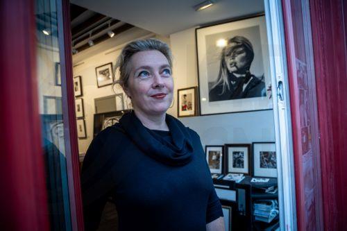 epa12692478 Julia Gragnon, daughter of the former photographer for Paris Match magazine Francois Gragnon and director of the Galerie de l'Instant, poses in front of her gallery where photographic prints of French actress Brigitte Bardot are exhibited for 'Et Dieu Crea Bardot' (And God created Bardot) in Paris, France, 30 January 2026.  EPA/CHRISTOPHE PETIT...