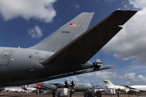 epa12701931 Visitors walk past aircrafts on static display during the Singapore Airshow at Changi Exhibition Centre, Singapore, 03 February 2026. The Singapore Airshow 2026, one of Asia’s largest aerospace and defense exhibitions, runs from 03 to 08 February.  EPA/HOW HWEE YOUNG
