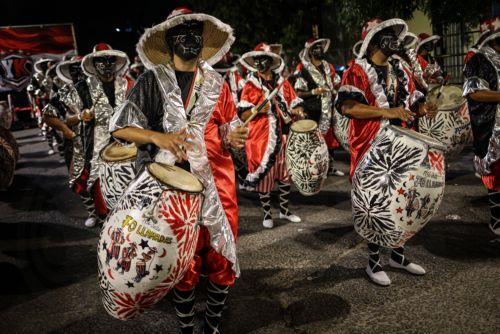 epa12711433 Artists participate in the 2026 Carnival Parade in Montevideo, Uruguay, 06 February 2026. The Uruguayan capital celebrates the 2026 Carnival Parade, which marks the beginning of a popular festival that prides itself on being the longest of its kind in the world, lasting approximately forty days.  EPA/Gastón Britos