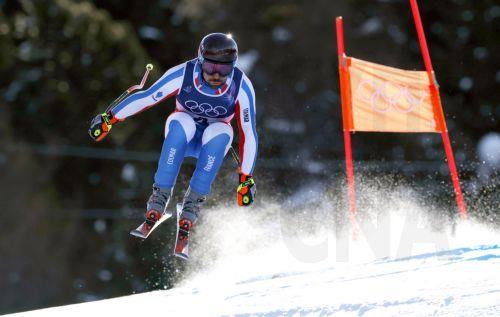 epa12711851 Maxence Muzaton of France competes in the Men's Downhill of the Alpine Skiing competition, at the Milano Cortina 2026 Winter Olympic Games, Stelvio ski centre in Bormio, Italy, 07 February 2026.  EPA/GUILLAUME HORCAJUELO