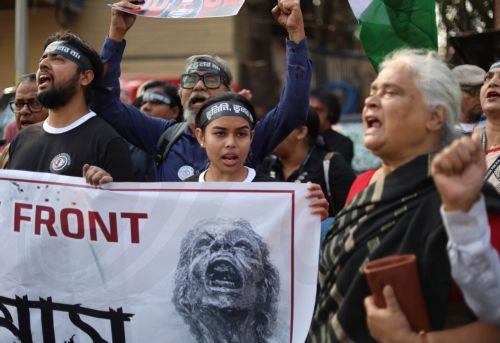 epa12719655 Doctors and citizens gather during a protest campaign against violence and rape targeting women in Kolkata, India, 09 February 2026. A trainee doctor was found dead on 09 August 2024 in a seminar room of the RG Kar Medical College in Kolkata, sparking nationwide protests and strikes by medical students and doctors. In January 2025, the main...