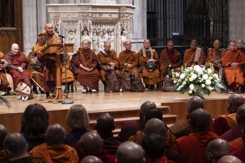 epa12725423 Bhikkhu Pannakara (L), a Theravada Buddhist monk, speaks to interfaith leaders at the Washington National Cathedral during the Walk For Peace in Washington, DC, USA, 10 February 2026. The Theravada Buddhist monks, who have walked from  Fort Worth, Texas, will make stops at the National Cathedral and Embassy Row before walking to the US Capitol...