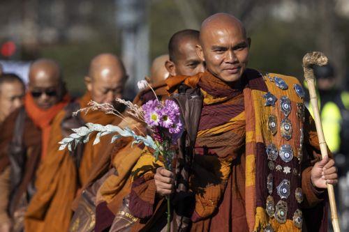 epaselect epa12725404 Bhikkhu Pannakara leads the Theravada Buddhist monks as they leave the Washington National Cathedral and move towards Embassy Row during the Walk For Peace in Washington, DC, USA, 10 February 2026. The Theravada Buddhist monks, who have walked from  Fort Worth, Texas, will make stops at the National Cathedral and Embassy Row before...