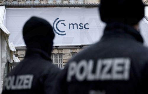 epa12731189 Policemen stand in front of the hotel 'Bayerischer Hof', the venue of the 62nd Munich Security Conference (MSC), in Munich, Germany, 12 February 2026. The 62nd Munich Security Conference, running from 13 to 15 February 2026, is expected to host around 50 world leaders.  EPA/RONALD WITTEK
