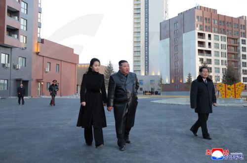 epa12745277 A photo released by the official Korean Central News Agency (KCNA) shows North Korean leader Kim Jong Un (center-R) and his daughter, Kim Ju Ae (center L), touring Saeppyol Street, a new housing district dedicated to the families of fallen soldiers in the Hawasong area of Pyongyang, North Korea, on 15 February 2026 (issued 16 February 2026)....