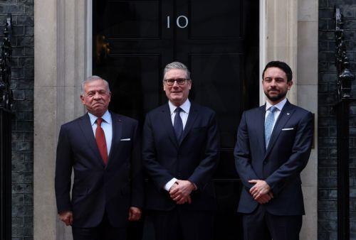epa12747215 British Prime Minister Keir Starmer (C) welcomes Jordan's King Abdullah II (L) and Crown Prince Hussein (R) to the Prime Minister's Office at 10 Downing Street in London, Britain, 16 February 2026.  EPA/ANDY RAIN