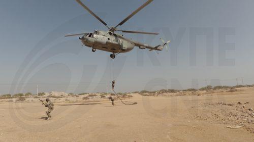 epa12747733 A handout photo made available by Iran's Islamic Revolutionary Guard Corps (IRGC)'s official website Sepahnews on 16 February 2026 shows IRGC members participating in a military drill in the Persian gulf, southern Iran. The IRGC launched a large-scale exercise in the Strait of Hormuz, state media reported. The drills follow an increased US...