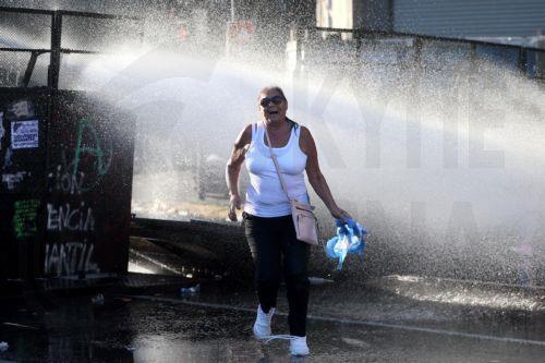 epa12760164 A protester runs during clashes with police at a demonstration against labor reform proposed by Argentine President Javier Milei in Buenos Aires, Argentina, 19 February 2026.  EPA/JUAN IGNACIO RONCORONI