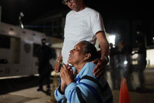 epa12760486 A person reacts upon learning of the historic approval of the amnesty law for political prisoners in front of the Bolivarian National Police (PNB) headquarters known as Zone 7, in Caracas, Venezuela, 19 February 2026. Relatives of Venezuela's political prisoners celebrated the approval of the amnesty law, which pardons cases from 2002 to 2025....