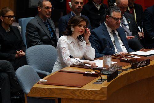 epa12774565 Ukraine's Deputy Foreign Minister Mariana Betsa (C) attends a United Nations (UN) Security Council meeting on peace and security marking the fourth anniversary of Russia's full-scale invasion in New York, New York, USA, 24 February 2026. Four years of war have left hundreds of thousands dead, displaced more than six million Ukrainians and...