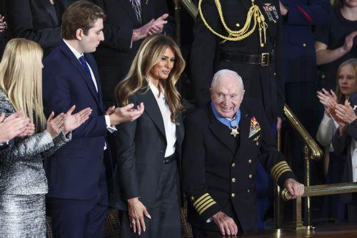 epa12775420 Retired Navy Captain E. Royce Williams (R) receives the Medal of Honor from First Lady Melania Trump (C-L) as he is recognized by US President Donald Trump during his State of the Union address before a joint session of Congress in the House of Representatives chamber of the US Capitol in Washington, DC, USA, 24 February 2026.  EPA/JIM LO SCALZO