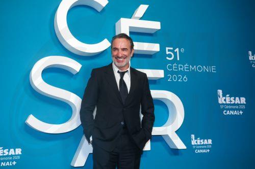 epa12780325 French actor Jean Dujardin  poses in the press room during the 51st annual Cesar awards ceremony held at the Olympia concert hall in Paris, France, 26 February 2026. The awards are presented by the French 'Academie des Arts et Techniques du Cinema' (Academy of Cinema Arts and Techniques).  EPA/CHRISTOPHE PETIT TESSON