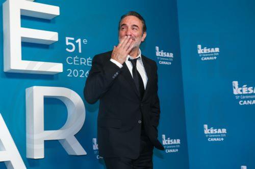 epa12780326 French actor Jean Dujardin poses in the press room during the 51st annual Cesar awards ceremony held at the Olympia concert hall in Paris, France, 26 February 2026. The awards are presented by the French 'Academie des Arts et Techniques du Cinema' (Academy of Cinema Arts and Techniques).  EPA/CHRISTOPHE PETIT TESSON