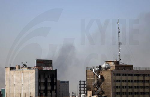 epaselect epa12782929 ​Smoke rises in central Tehran after Israel attack, 28 February 2026. Israel launched an attack on Iran on 28 February 2026, described as a "preemptive strike" by Israeli Defence Minister Israel Katz.  EPA/ABEDIN TAHERKENAREH