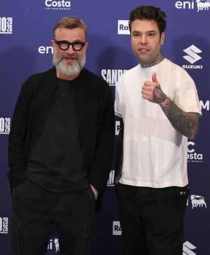 epa12783106 Italian singers Fedez (R) and Marco Masini (L) pose during a photocall at the 76th Sanremo Italian Song Festival, Sanremo, Italy, 28 February 2026. The Music Festival runs from 24 to 28 February 2026.  EPA/ETTORE FERRARI