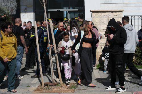 epa12783361 Israelis are evacuated from their building that got hit by a missile fired from Iran, in Tirat Hacarmel near Haifa, Israel, 28 February 2026. The Israeli military reported on 28 February it deteced missiles launched from Iran following earlier Israeli and US strikes. Sirens were activated across several parts of the country in response. ...