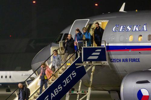 epa12792886 People disembark from a Czech repatriation flight from Amman, Jordan, at the Vaclav Havel airport in Prague, Czech Republic, 03 March 2026. The first evacuation flight carried Czech citizens who were stranded in the Middle East. The Czech Republic and other countries are evacuating their citizens from the region as the conflict between Israel,...