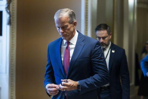 epa12793068 Republican Senate Majority Leader John Thune walks to his office before being briefed by Trump officials about the conflict in Iran about at the US Capitol in Washington, DC, USA, 03 March 2026. Iran is warning of an escalated conflict in response to a joint US-Israeli military campaign that began 28 February.  EPA/JIM LO SCALZO