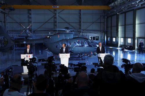 epa12806509 French President Emmanuel Macron (L), Cypriot President Nikos Christodoulides (C), and Greek Prime Minister Kyriakos Mitsotakis take part in a joint press conference at Paphos military airport, in Paphos, Cyprus, 09 March 2026, on the day of Macron's visit to show France's solidarity after recent drone attacks amid the U.S.-Israeli conflict with...