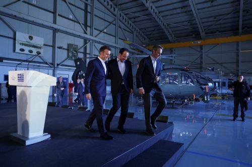 epa12806535 French President Emmanuel Macron (L), Cypriot President Nikos Christodoulides (C), and Greek Prime Minister Kyriakos Mitsotakis leave after a joint press conference at Paphos military airport, in Paphos, Cyprus, 09 March 2026, on the day of Macron's visit to show France's solidarity after recent drone attacks amid the U.S.-Israeli conflict with...