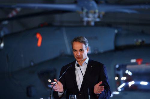 epa12806587 Greek Prime Minister Kyriakos Mitsotakis speaks during a joint press conference with Cyprus' and France's presidents at Paphos military airport, in Paphos, Cyprus, 09 March 2026, on the day of Macron's visit to show France's solidarity after recent drone attacks amid the U.S.-Israeli conflict with Iran, and aimed at reinforcing European security...